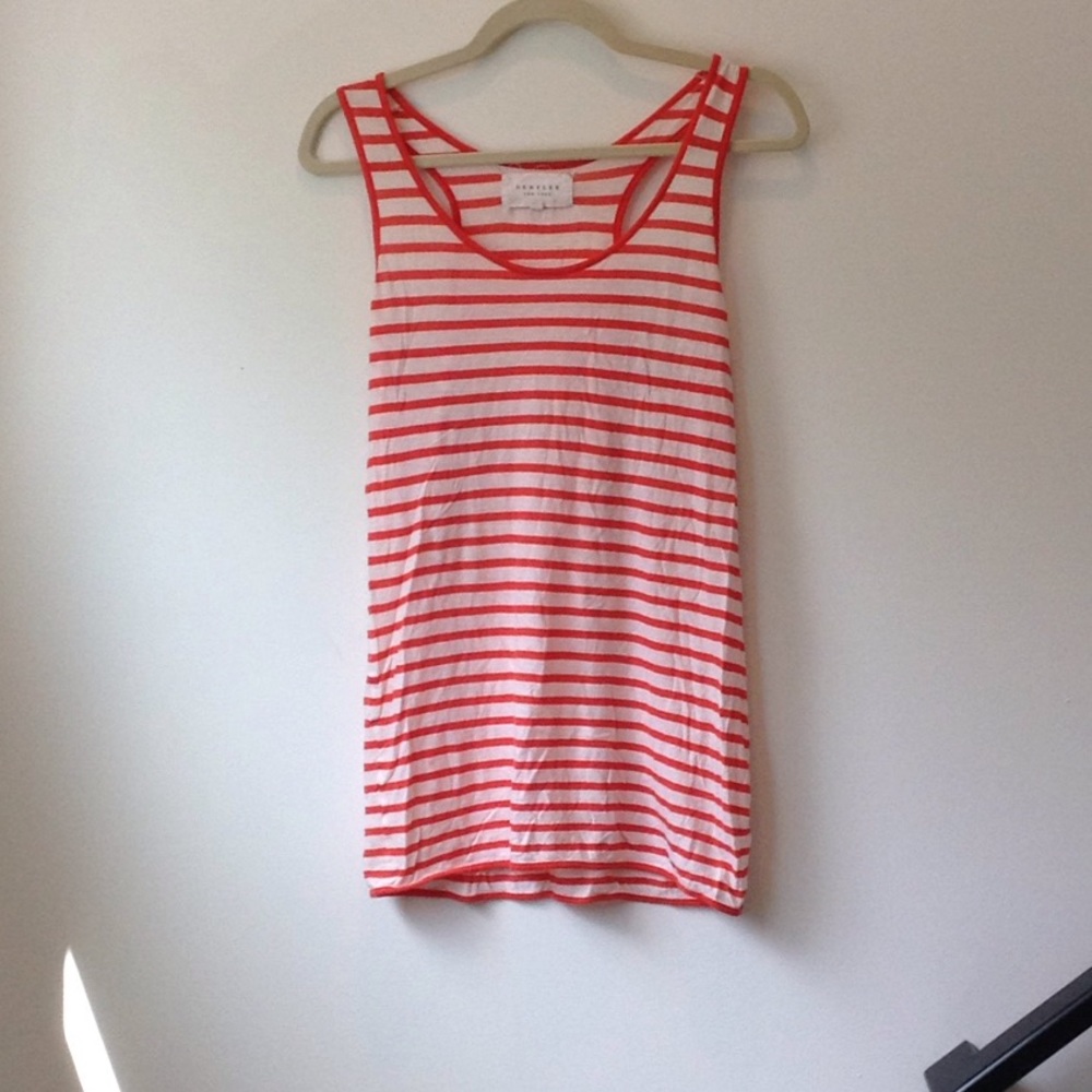 Orange and cream striped tank top.